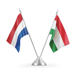 Tajikistan and Netherlands table flags isolated on white 3D rendering