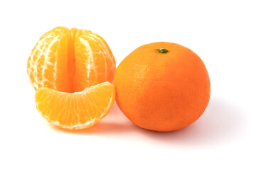 Ripe tangerines with leaves on a white background.