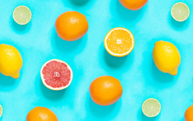 Seamless Citrus fruits pattern on the blue background. Top view