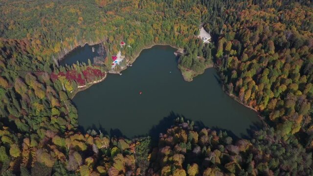 A drone view of the lake and green nature which is fascinating. As additional information, the name of this lake is Karagol and it is located in Artvin/Turkey