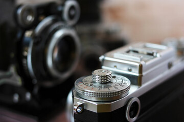 Fototapeta na wymiar Control wheel on an old film camera