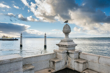 early morning on The Pier of Columns in Lisbon, Portugal