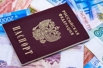 Russian passport and money. Ruble bills and document.