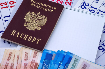 Russian passport. Calendar and Money. Ruble bills and stationery.