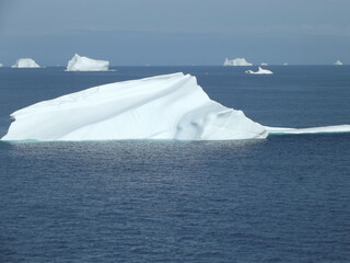 icebergs in the disco bay near ilulissat, greenland