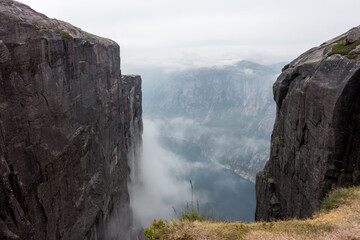 Mountains in fog at beautiful day in autumn