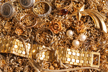 Background of various gold jewelry
