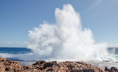 waves crashing on rocks Australia