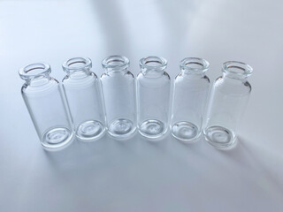 test tubes in laboratory,  empty glass bottles for medicine in laboratory