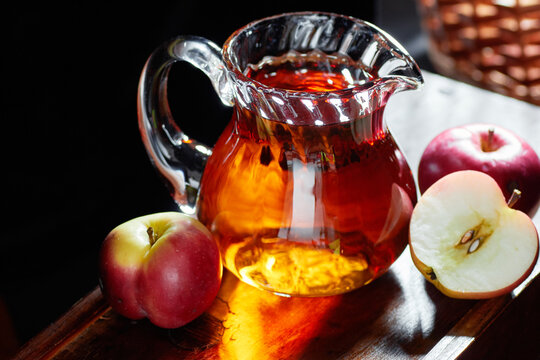 Apple Vinegar, Malt Fruit Cider Drink In A Glass Decanter On Dark Black Background, Closeup, Copy Space, Healthy Drink Used In Natural Cosmetics, As Cleaner And Body Care