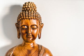 Buddha statue meditating with faith minimalist