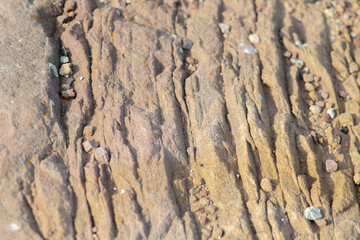 Striped stones. Sandstone. Rock texture