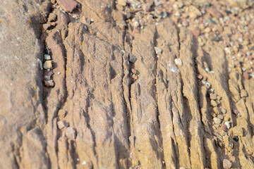 Striped stones. Sandstone. Rock texture