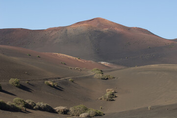 Volcanic landscape in the Timanfaya National Park. Lanzarote. Canary Islands. Spain.