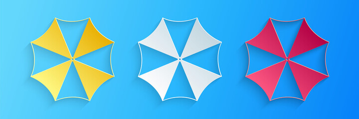 Paper cut Sun protective umbrella fo beach icon isolated on blue background. Large parasol for outdoor space. Summer vacation or picnic accessory. Paper art style. Vector. © mingirov