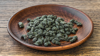 selective focus photo of real chinese ginseng oolong. premium green leaf tea.