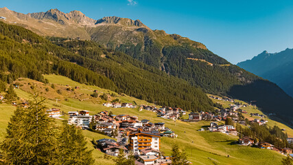 Fototapeta na wymiar Beautiful alpine summer view with a far view of Soelden at the famous Gaislachkogel summit, Soelden, Oetztal, Tyrol, Austria