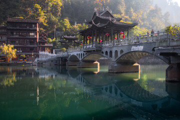 Naklejka premium Fenghuang (Phoenix) ancient town at night, Hunan province, China.