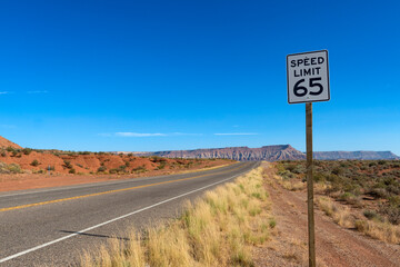 Scenic road near the Zion National Park in the State of Utah, with the beautiful red sandstone mountains.