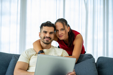 Caucasian couple lovers work from home new normal with computer laptop notebook