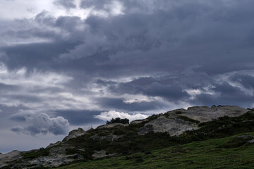 Mountain landscape with stormy clouds