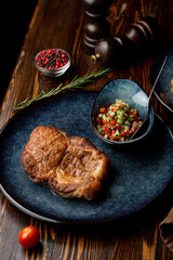 Meat restaurant photo for a food magazine, masculine atmosphere