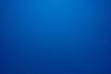 Abstract grunge decor. Beautiful dark blue stucco wall background. Space for designing and inserting text.