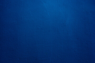 Abstract grunge decor. Beautiful dark blue stucco wall background. Space for designing and inserting text.
