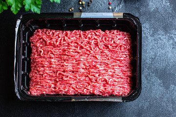 minced meat ground pork or beef, chicken or turkey fresh ingredient cooking on the table for healthy meal top view copy space for text food background rustic image