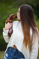 young woman with her dachshund