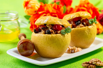 Baked apples with nuts, oatmeal, raisins and honey.
