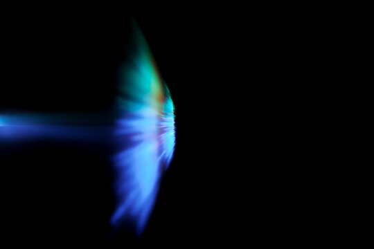 defocused sound barrier light effect on dark background, motion blur