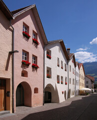 Fototapeta na wymiar Restored medieval old town of Glurns in the Alps with front-gabled massive houses with arcades in Laubengasse street, Vinschgau region, South Tyrol in Italy