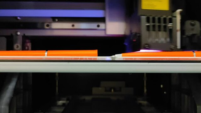UV printer head, close up view of printing process