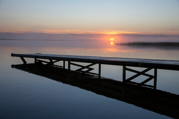 Fototapeta na wymiar Sunrise Northern Lake Dock