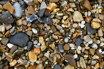 background of stones, network of rocks on a beach