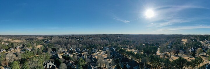 Fototapeta na wymiar Panoramic aerial view of an upscale subdivision in suburbs of Atlanta city in USA