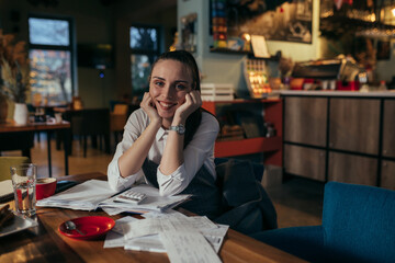 woman entrepreneur dealing with financial in her restaurant