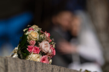 Vivid bridal bouquet of roses with nice bokeh