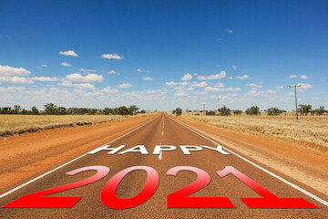 Happy 2021 read and white gradient text on empty road in Outback Australia desert. Way to new year, travel concepts. Visionary, celebration, projects, horizon, future symbolism