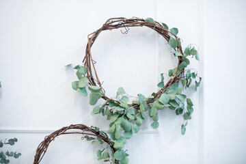 A wreath of eucalyptus in the interior. Japanese design combined with Scandinavian minimalism in a...