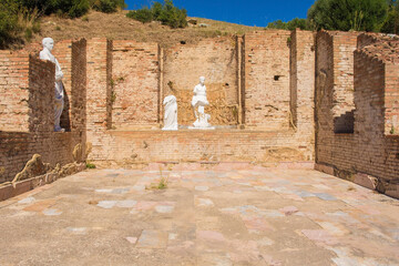 The ruins of the Bassi Basilica in Roselle or Rusellae, an ancient Etruscan and Roman city in Tuscany. The apses contain statues dating from the 1st century A.D 
