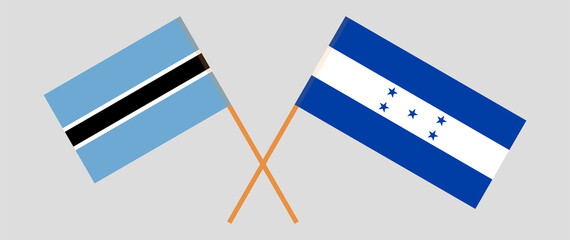 Crossed flags of Botswana and Honduras