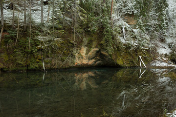 City Cesis, Latvia. Red sand rocks and snow in winter.Travel photo.