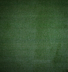 Fototapeta premium dark background of artificial green sports turf