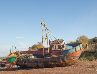 Derelict rusting fishing boat in Bagillt dock Flintshire, North Wales