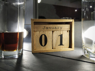 Wooden calendar shows January 1th. New year concept 2021.