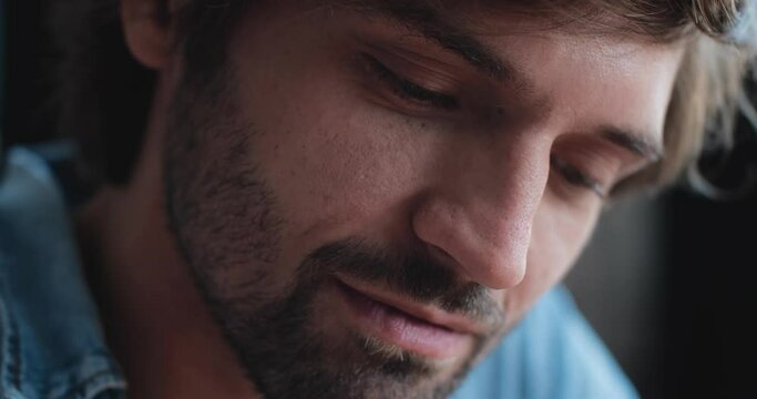 Close Up Face and Hand of Artist, Drawer is making Cartoon or comix Character. Handsome Man is drawing concentrated, focused, enjoying this Process. Creative Profession, people, Person.