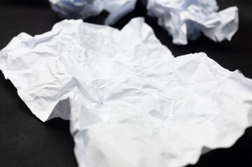 A few crumpled pieces of white paper