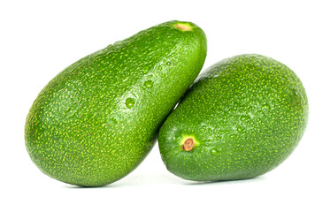 Two green avocado closeup on a white background.